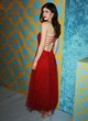 Alexandra Daddario shows her figure in red dress pics