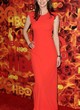 Alexandra Daddario posing in a fiery red dress pics