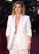 Kate Winslet stuns in white pantsuit pics