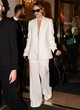 Olivia Wilde wears daring cream pantsuit pics