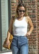 Olivia Wilde white crop top and blue jeans pics