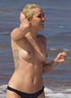Miley Cyrus topless on the beach, sexy pics