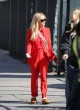 Reese Witherspoon dazzles in tailored red suit pics