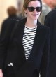 Emma Watson shows her style at jfk airport pics