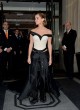 Emma Watson rocks a skirt and corset dress pics