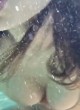 Alexandra Daddario naked pics - dives and shows deep cleavage