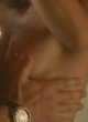Delphine Chaneac small tits in erotic scene pics