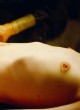 Emma Stone shows tits in sexy scene pics
