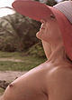 Rene Russo tanning topless in nature pics