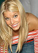Jessica Simpson in jeans and striped tanktop pics