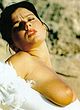 Geri Halliwell naked pics - relaxing nude in forest