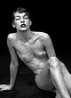 Milla Jovovich naked pics - nude and sexy posing pics