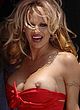 Pamela Anderson naked pics - pops a boobs paparazzi pics