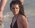 Evangeline Lilly posing in wet bikini clips