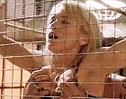 Rebecca De Mornay gets licked through cage clips