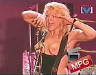 Courtney Love shows her nude tits on concert videos