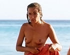 Valeria Golino sunbathes topless on beach nude clips