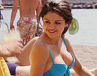 Selena Gomez sunbathing in blue bikini videos