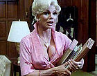 Loni Anderson busts out big cleavage clips