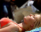 Maggie Grace sunning in a bikini clips