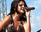 Selena Gomez on stage in action videos