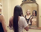 Sarah Butler flashes her tits in the mirror clips