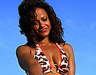 Judy Reyes sexy cleavage in tight bikini videos