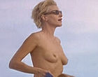 Anna Gunn topless on boat & sexy bikini videos