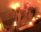 Portia de Rossi naked in tub shows tits & bush clips