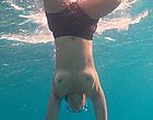 Sarita Choudhury swims topless in the ocean nude clips