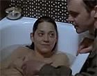 Marion Cotillard topless in a bathtub nude clips