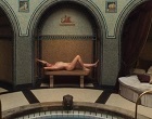 Jenny Shily lying naked on a stone bench nude clips