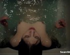 India Eisley exposing breasts in bathtub nude clips