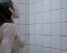 Olga Kurylenko showing right boob in shower clips