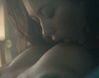 Olga Kurylenko nude tits in lesbian scene clips
