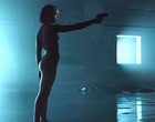 Tessa Thompson fully nude holding a gun clips