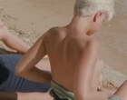 Mena Suvari shows her boobs on the beach clips