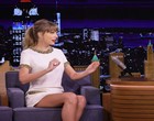 Taylor Swift stuns in a white mini dress clips