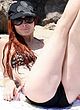 Phoebe Price teasing in bikini on a beach pics