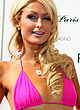 Paris Hilton sunbathes topless & bikini pics