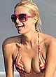 Paris Hilton deep cleavage & bikini shots pics