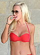 Jenny McCarthy busty at red bikini session pics