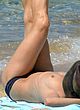 Vanessa Paradis sunbathes topless and bikini pics