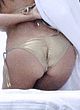 Kourtney Kardashian shows huge bum in tight bikini pics