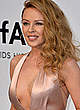 Kylie Minogue slight cleavage in long dress pics