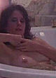 Nancy Travis naked pics - nude wet boobs in bath tub