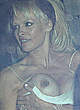 Pamela Anderson naked pics - boobslip at chateau marmont