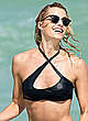 Lena Gercke in black bikini on a beach pics