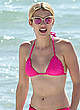 Emma Roberts in pink bikini on a beach pics