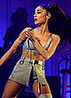 Ariana Grande performing on a stage pics